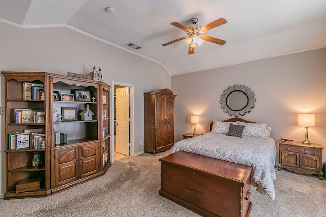 carpeted bedroom featuring crown molding, ceiling fan, and lofted ceiling