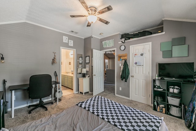 carpeted bedroom featuring ensuite bath, a textured ceiling, ceiling fan, crown molding, and lofted ceiling