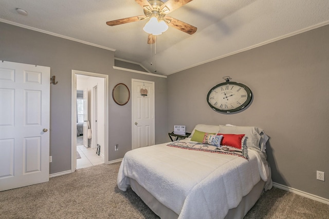 bedroom with light carpet, ornamental molding, ceiling fan, and lofted ceiling