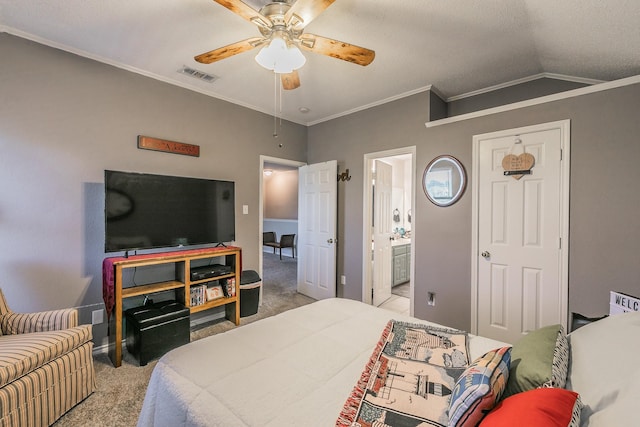 bedroom featuring lofted ceiling, ensuite bath, ceiling fan, ornamental molding, and light colored carpet