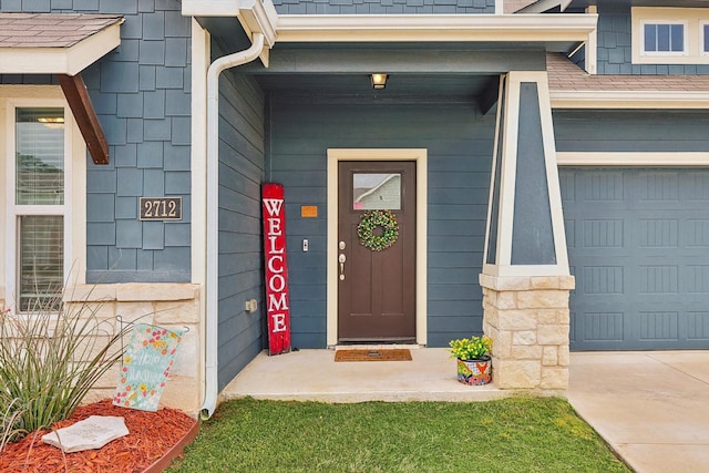 entrance to property featuring a garage