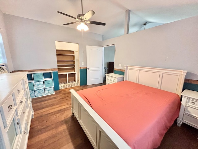 bedroom featuring ceiling fan, wood-type flooring, and lofted ceiling