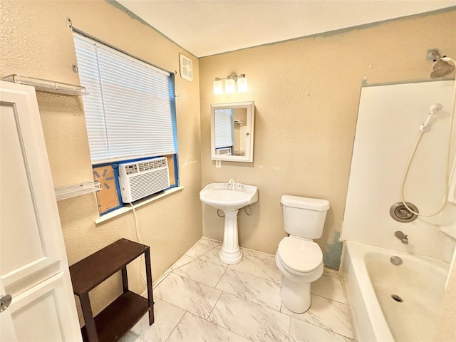 bathroom featuring shower / washtub combination, cooling unit, and toilet