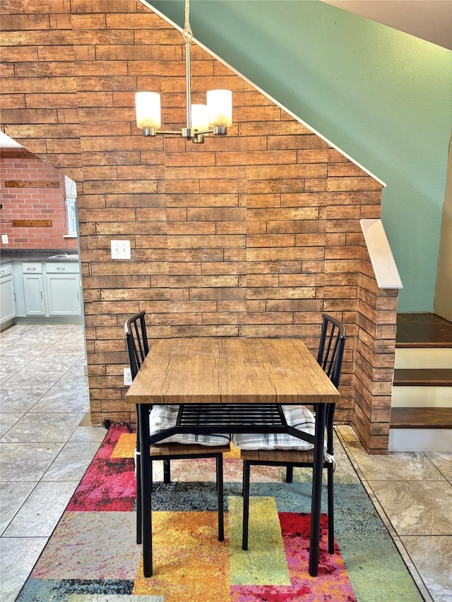 dining space with lofted ceiling