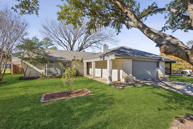 ranch-style home with a front lawn and a garage