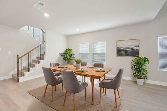 dining room featuring light hardwood / wood-style flooring