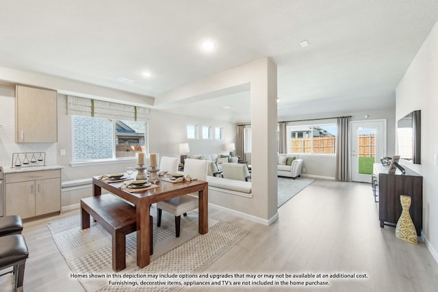 dining room featuring light hardwood / wood-style floors