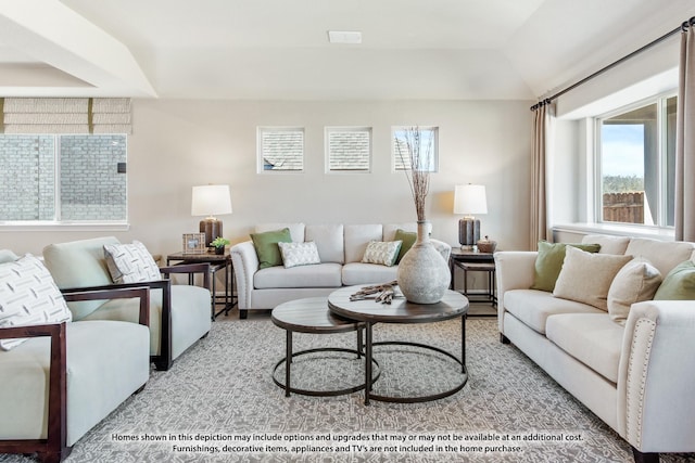 living room with vaulted ceiling