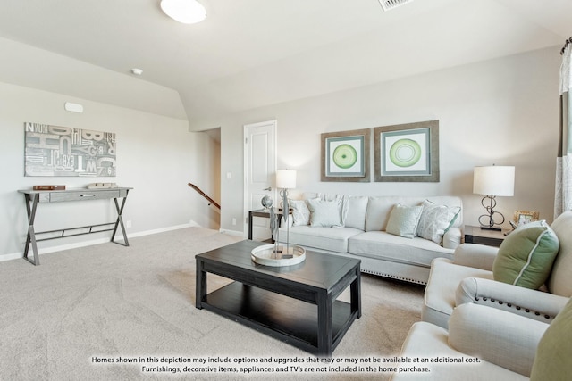 living room with carpet flooring and vaulted ceiling