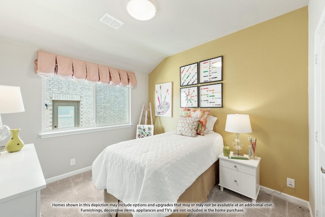 carpeted bedroom with vaulted ceiling