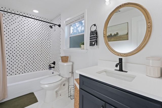 full bathroom featuring tile patterned floors, vanity, toilet, and tub / shower combination