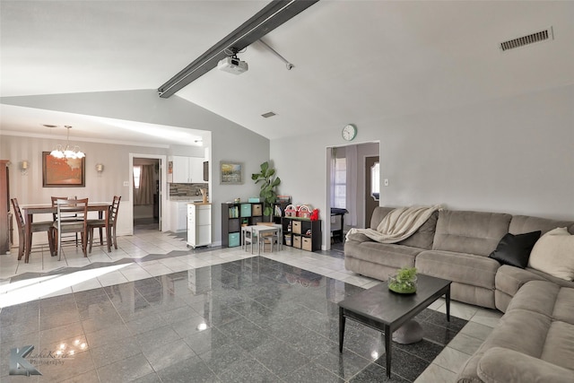 living room with a chandelier and lofted ceiling with beams