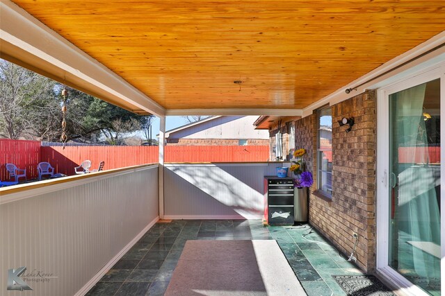 view of patio / terrace with a balcony