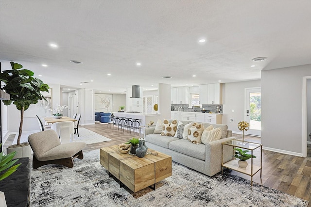 living room with wood-type flooring