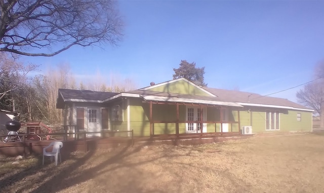 view of back house at dusk