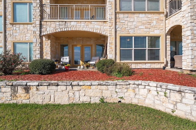 doorway to property with a balcony