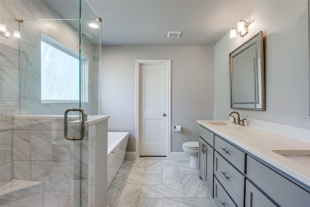 bathroom featuring a garden tub, visible vents, toilet, a stall shower, and a sink