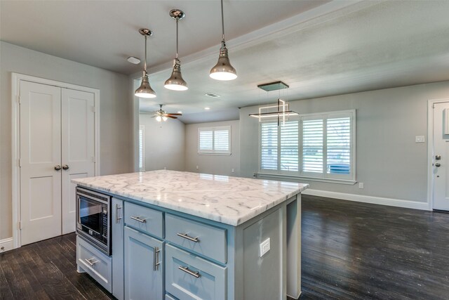 rear view of house featuring an outdoor living space with a fire pit and a patio area