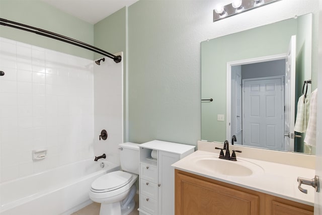 full bathroom featuring vanity, shower / washtub combination, and toilet