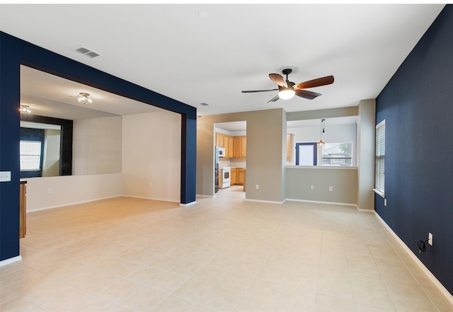 empty room with ceiling fan