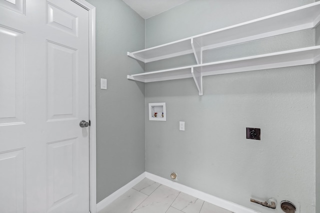 clothes washing area featuring electric dryer hookup, hookup for a gas dryer, and washer hookup