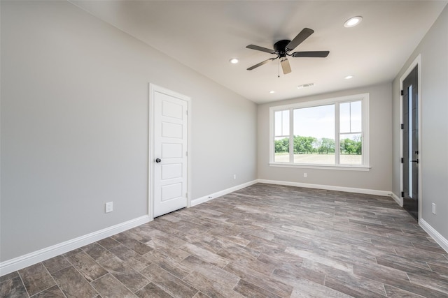 unfurnished room with ceiling fan