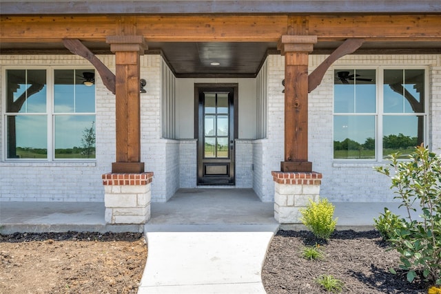 doorway to property featuring covered porch