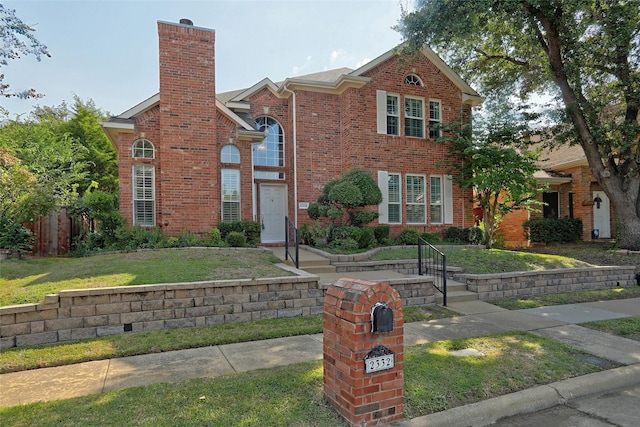 view of front of home with a front lawn