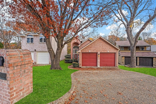 view of front facade featuring a garage and a front lawn