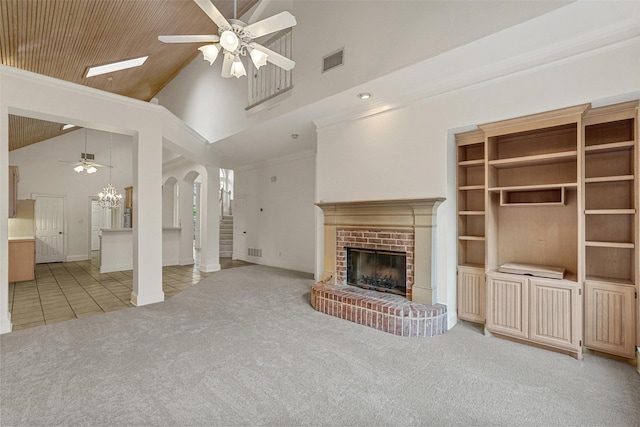 unfurnished living room with light carpet, high vaulted ceiling, a fireplace, and wooden ceiling