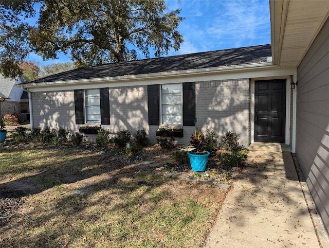 exterior space with a front yard