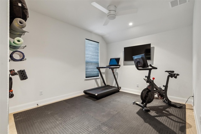 workout area with ceiling fan and lofted ceiling