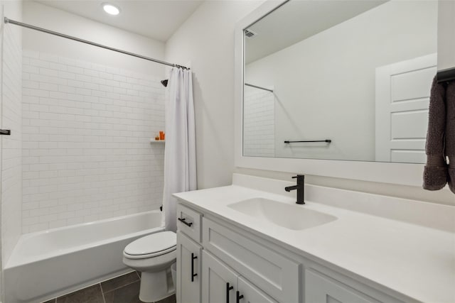 full bathroom with toilet, shower / tub combo, vanity, and tile patterned floors