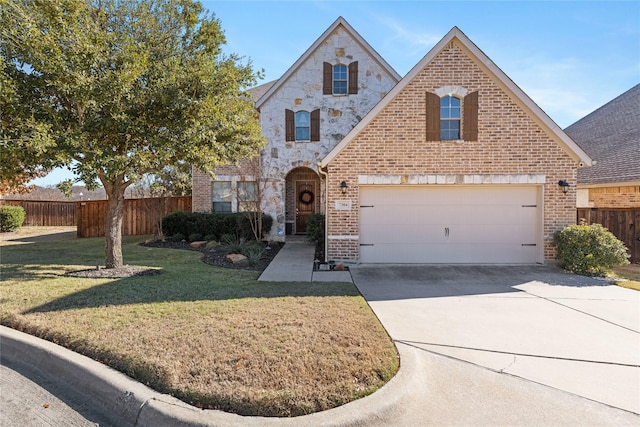 front facade featuring a front lawn and a garage