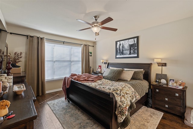 bedroom featuring dark hardwood / wood-style floors and ceiling fan