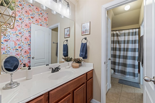 bathroom featuring tile patterned floors, vanity, toilet, and a shower with shower curtain