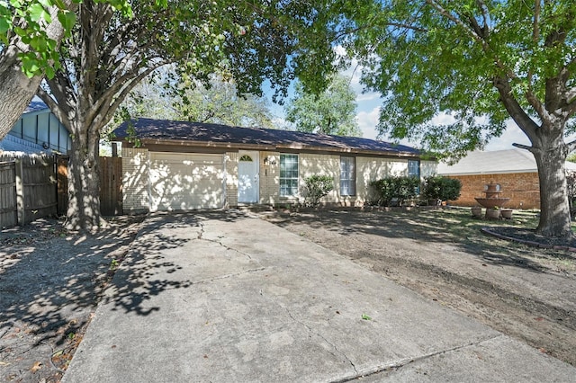 single story home with a garage