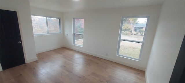 empty room featuring light hardwood / wood-style floors