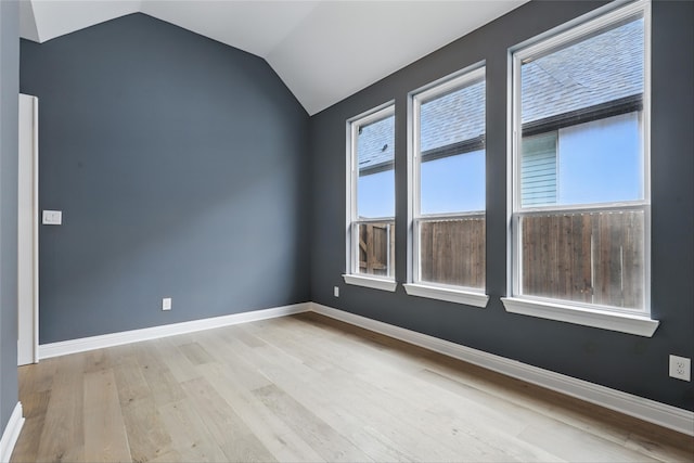 6300 Whitebrush Pl, Fort Worth, TX 76123 - spare room with light wood-style floors, vaulted ceiling, and baseboards