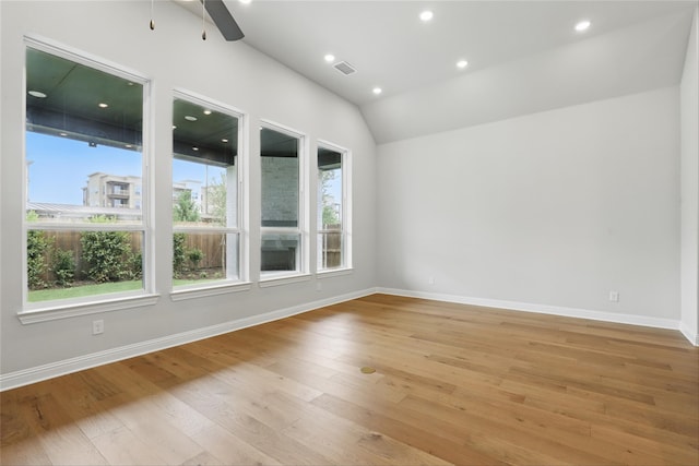 6300 Whitebrush Pl, Fort Worth, TX 76123 - spare room featuring healthy amount of natural light, light wood-type flooring, a ceiling fan, vaulted ceiling, and baseboards