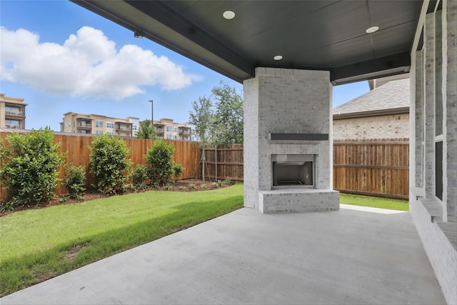 6300 Whitebrush Pl, Fort Worth, TX 76123 - view of patio / terrace featuring an outdoor brick fireplace