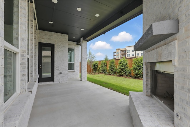 6300 Whitebrush Pl, Fort Worth, TX 76123 - view of patio featuring an outdoor brick fireplace