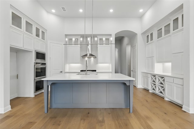 6300 Whitebrush Pl, Fort Worth, TX 76123 - kitchen featuring appliances with stainless steel finishes, white cabinetry, light countertops, tasteful backsplash, and recessed lighting
