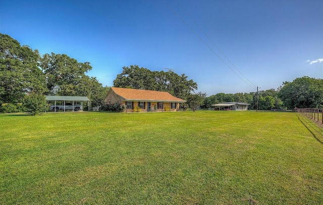 view of yard featuring a carport