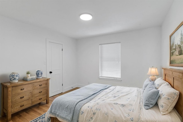 bedroom featuring light hardwood / wood-style floors