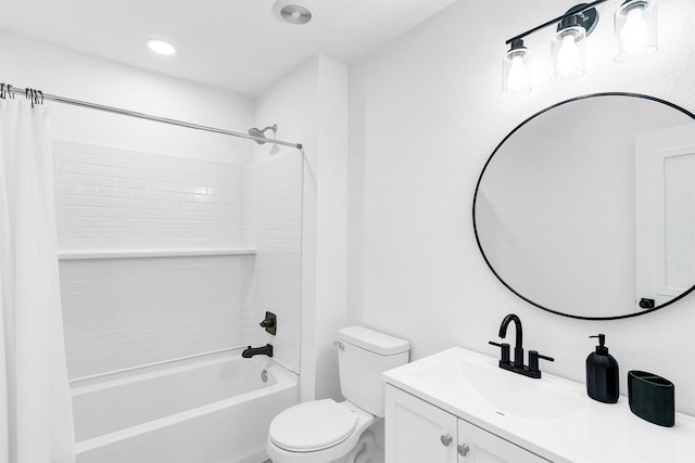 full bathroom featuring shower / bath combination with curtain, vanity, and toilet