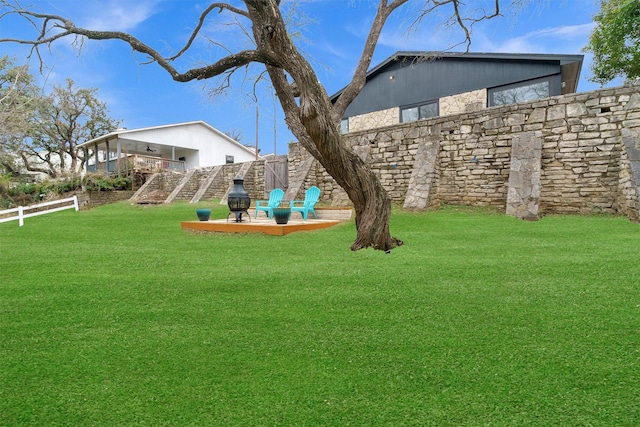 view of yard with a wooden deck