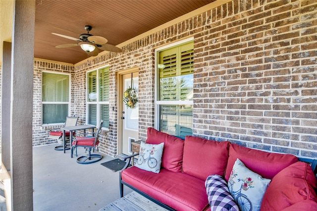 view of patio featuring outdoor lounge area, ceiling fan, and covered porch