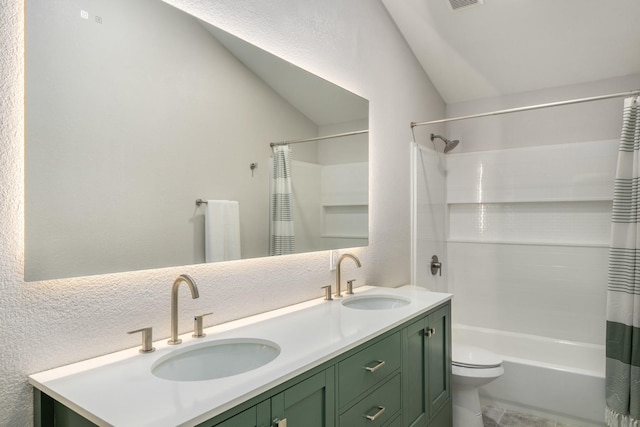 full bathroom with shower / tub combo with curtain, vanity, lofted ceiling, and toilet