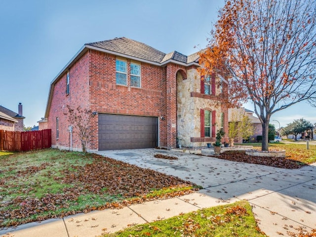 front facade with a garage